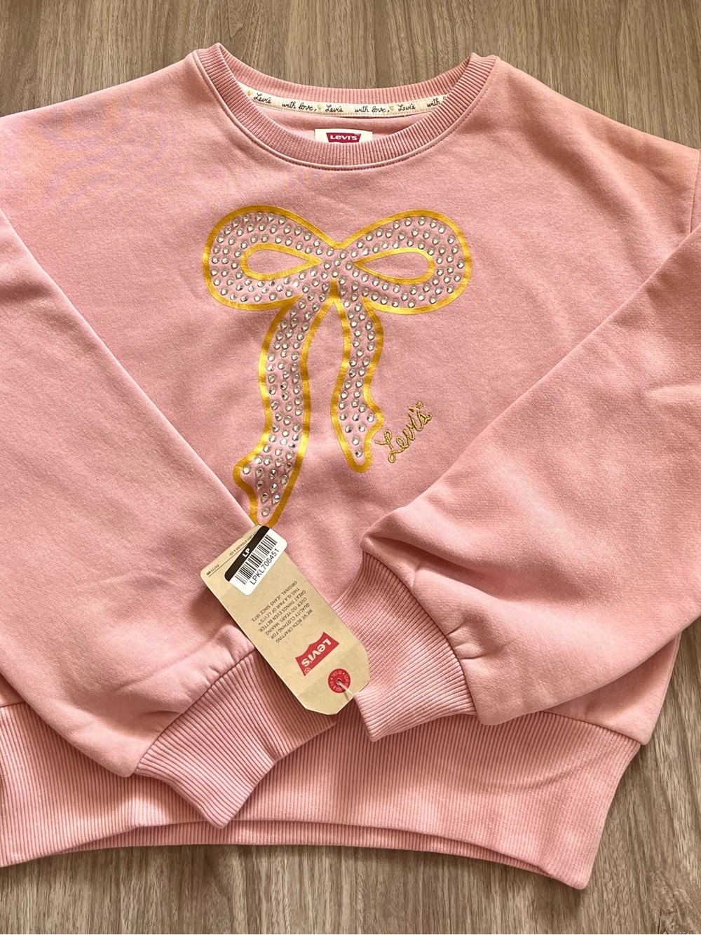 New With Tags, Girls Size L (11-12) Levi’s Pink Embellished Sweatshirt.